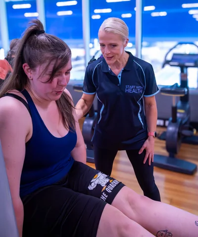 Personal trainer coaching a client at Start With Health Greensborough